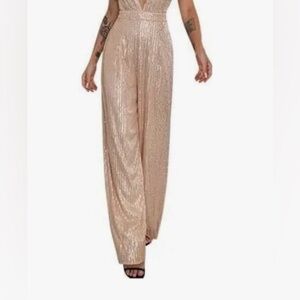 Jumpsuit Length 3/4 Length Sleeveless V Neck Sequined front and back.